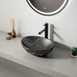 Czarna umywalka nablatowa matowa owalna ceramiczna 41x34,5 cm