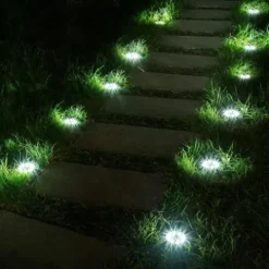 LAMPA SOLARNA OGRODOWA LAMPKI LED GRUNTOWE DYSK CZUJNIK ZMIERZCHU 12 DYSKÓW